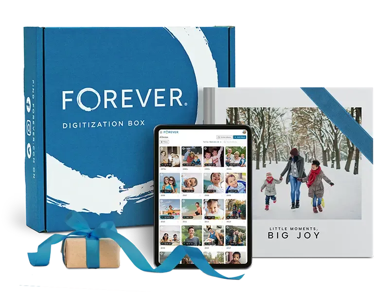 Forever digitization box with tablet showing photo gallery and 'Little Moments, Big Joy' photo book