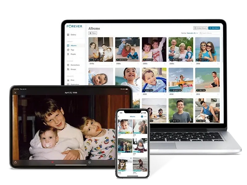 Forever photo albums organized by decade across multiple devices showing family photos